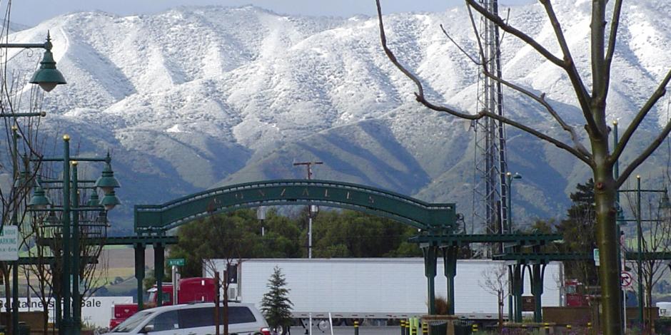 Gonzales Arch with Snowy Mountains