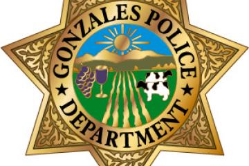 gold star with Gonzales logo in center, Gonzales Police Department
