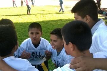 group of kids at soccer field