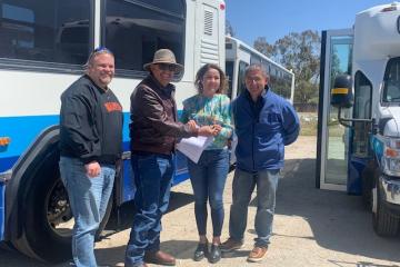 Tateposco delegation recieving the keys to thier new buses 