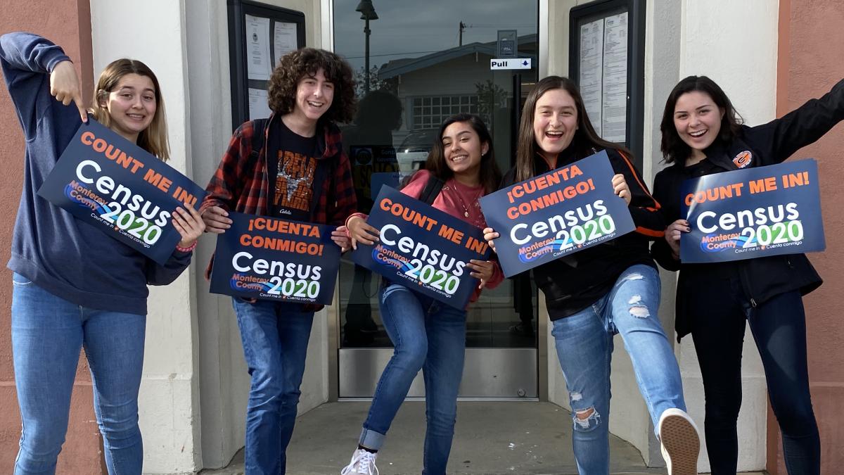 Complete your Census 2020 forms Photo: Gonzales youth holding Census signs